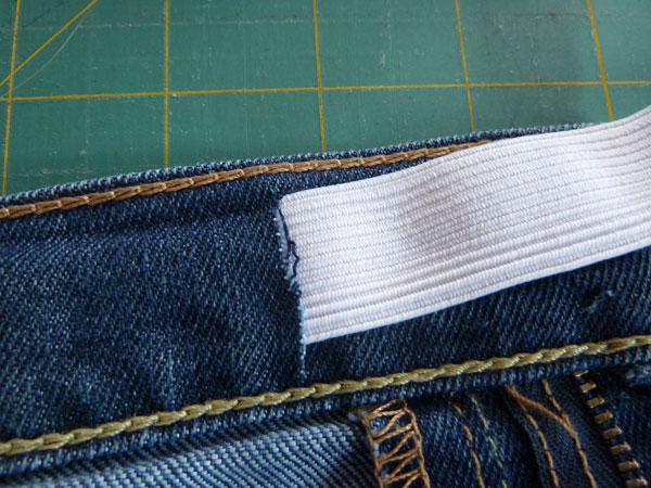 Thread 2 small pieces of elastic through waistband to tighten elastic waist.